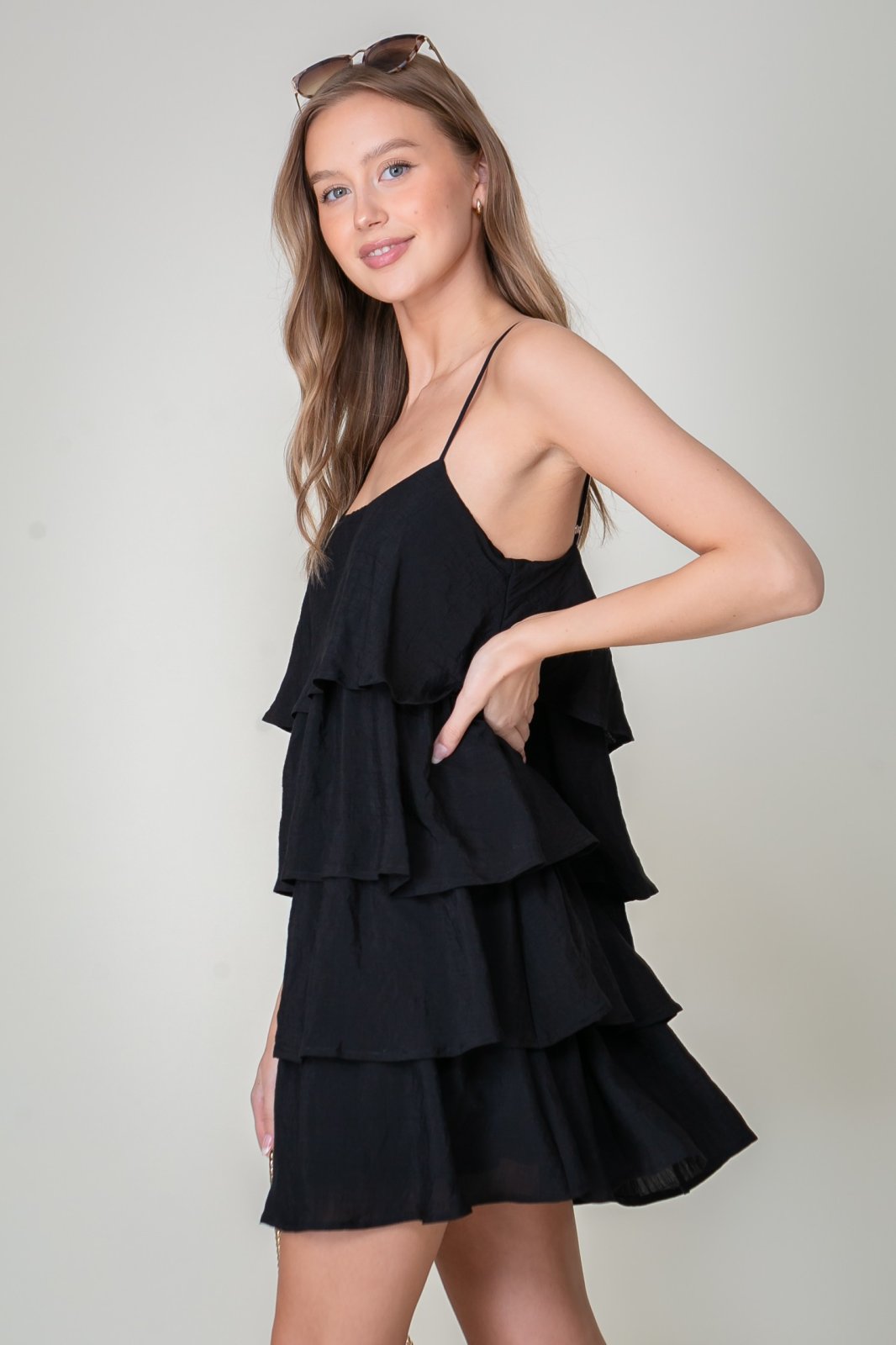 Lulu Dress from Raggdoll Boutique in black, featuring a tiered silhouette and adjustable straps, perfect summer outfit.