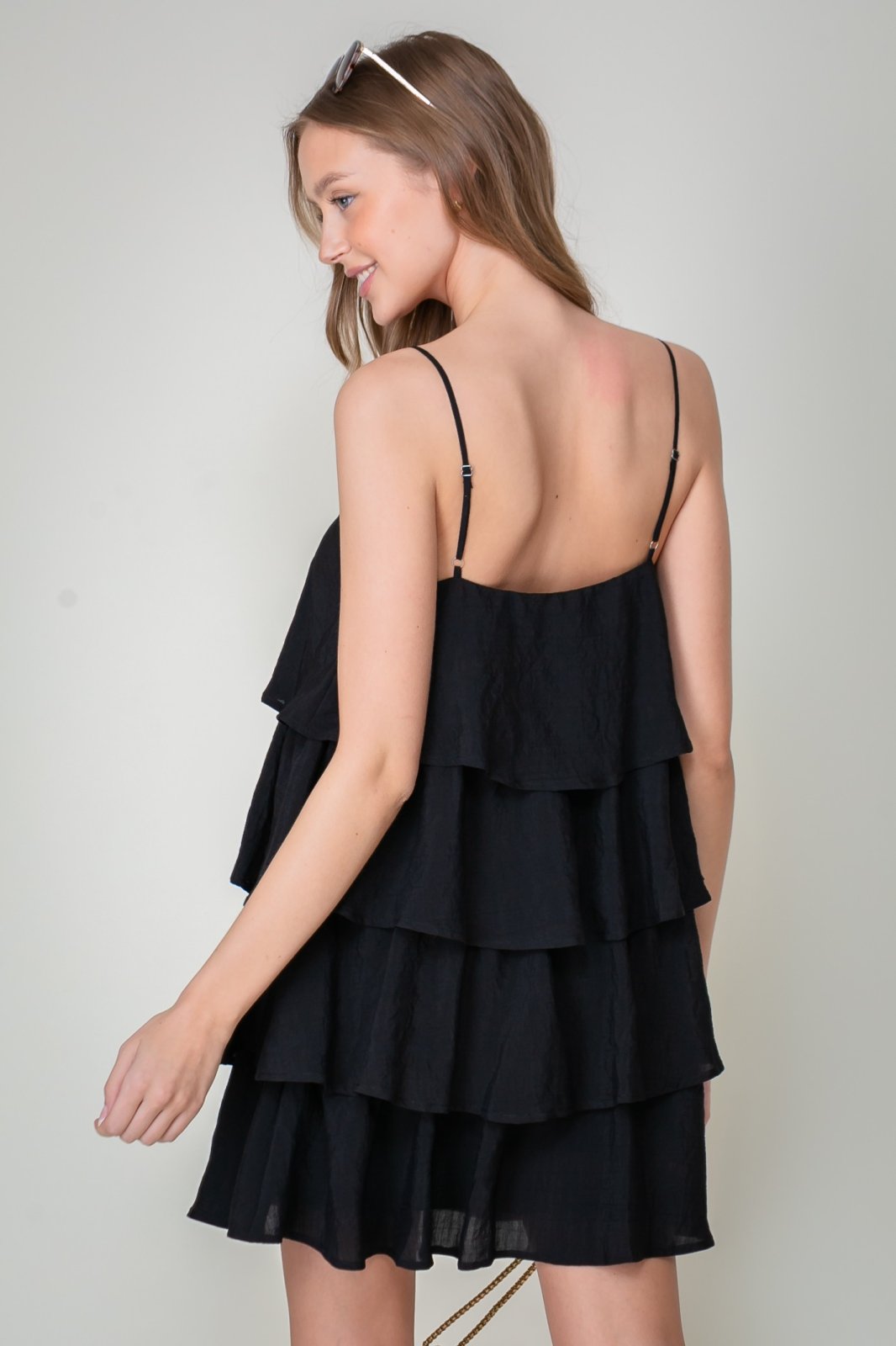 Lulu Dress from Raggdoll Boutique featuring a tiered silhouette and adjustable straps, perfect for summer outfits Texas.