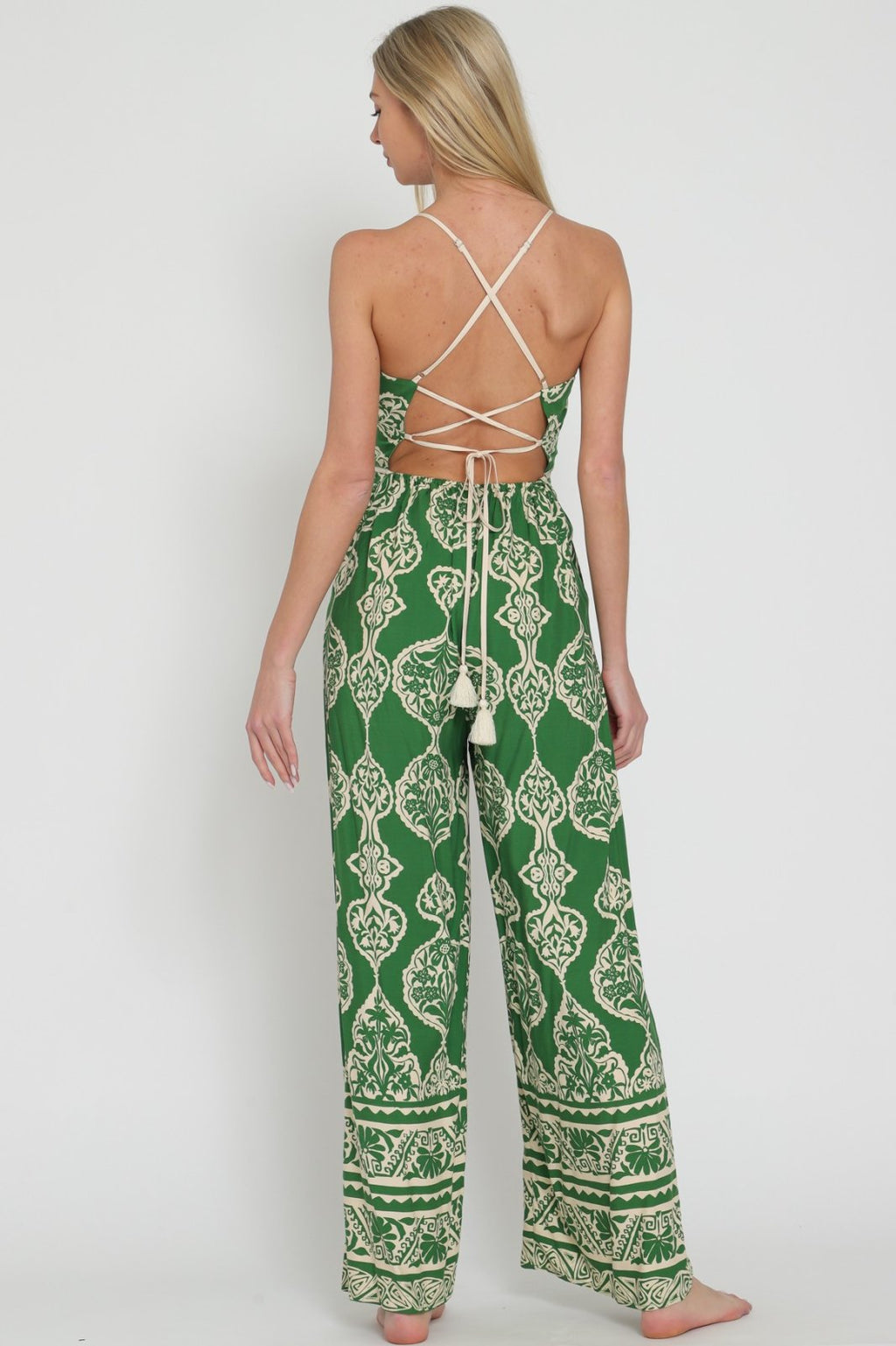 Back view of the Kelly Jumpsuit from Raggdoll Boutique, showcasing trendy coastal style and summer outfits Texas.