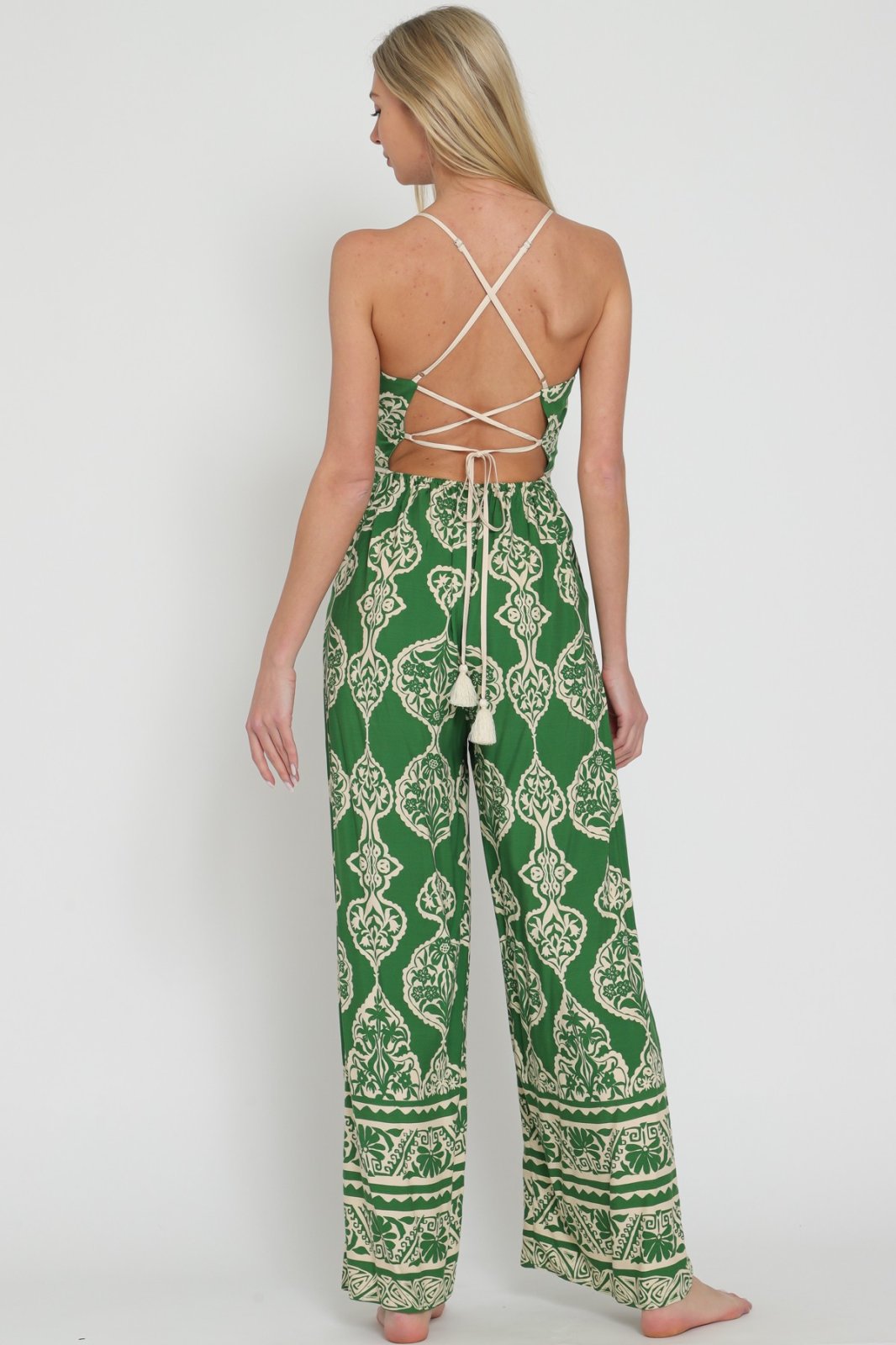 Back view of the Kelly Jumpsuit from Raggdoll Boutique, showcasing trendy coastal style and summer outfits Texas.