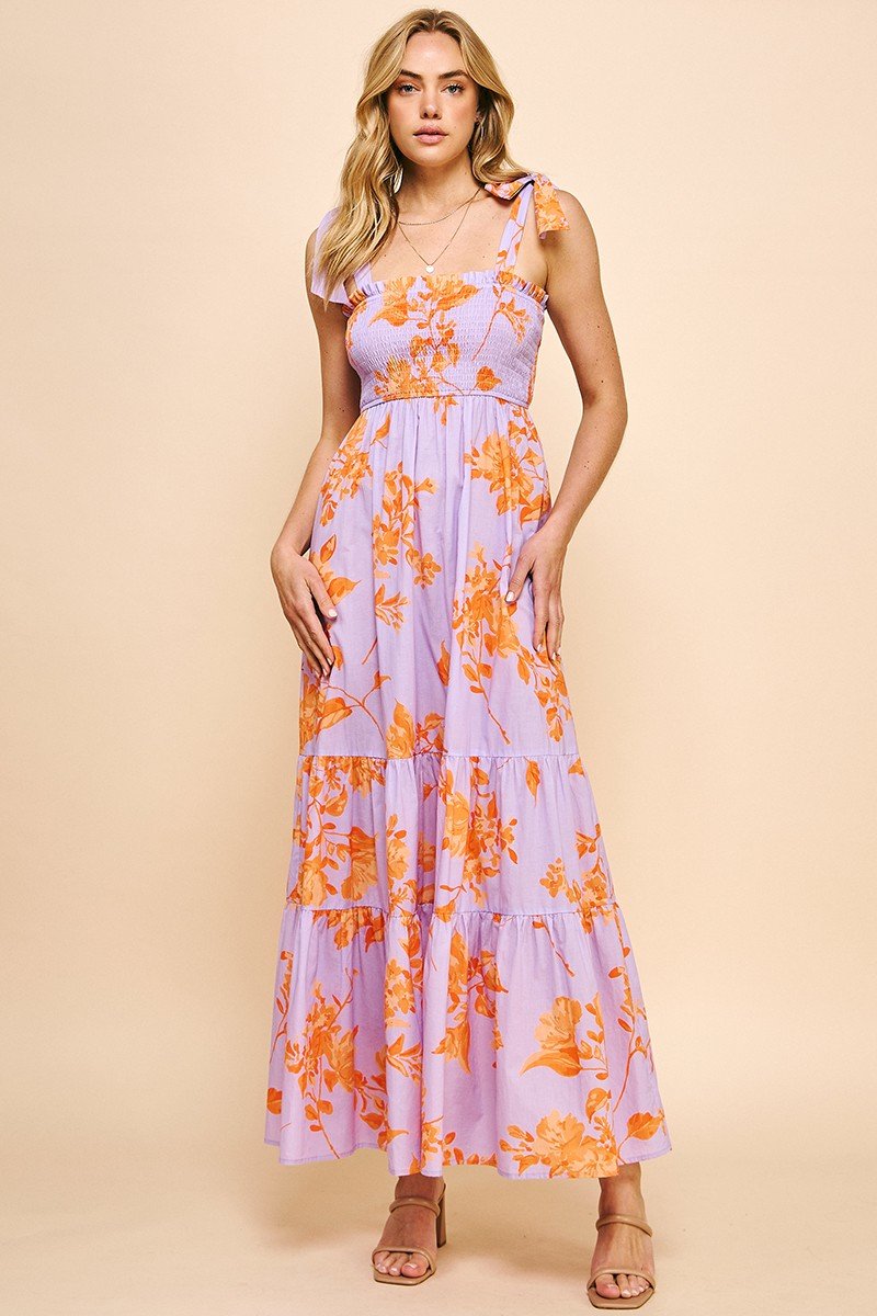 Evelyn Dress floral tiered maxi dress with tie shoulder straps from Raggdoll Boutique in Port Aransas.