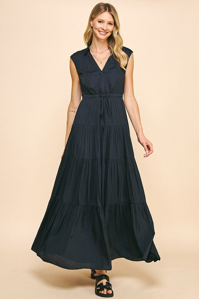 Navy-Ink maxi dress from coastal boutique clothing, perfect for a night out. Stylish and versatile, ideal for tropical vacations.