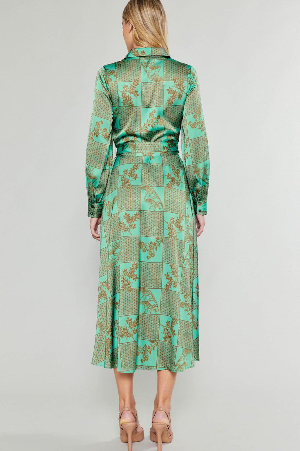 Jules Dress showcasing vibrant green print, perfect for coastal boutique clothing and tropical vacation dresses.
