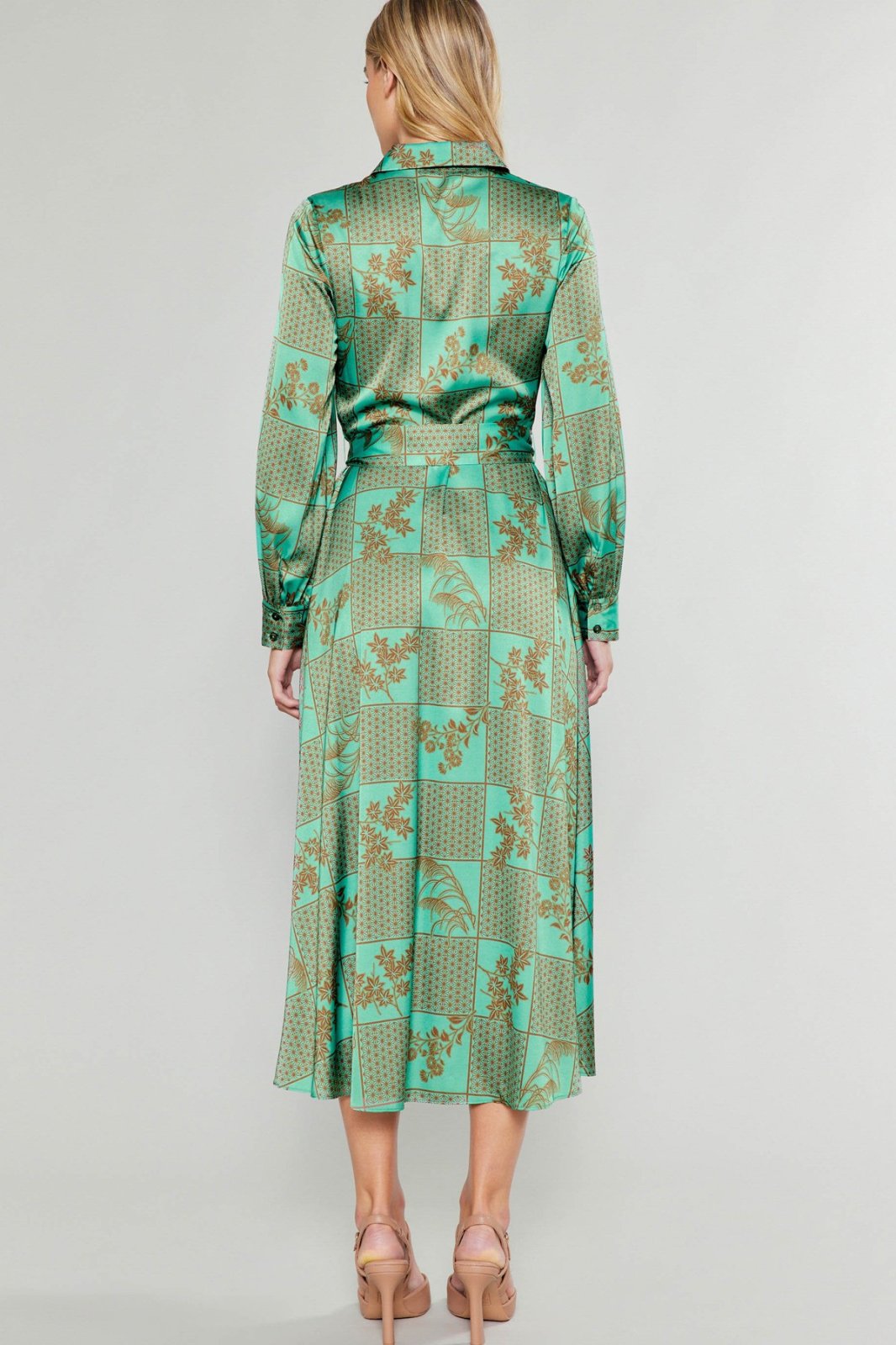 Jules Dress showcasing vibrant green print, perfect for coastal boutique clothing and tropical vacation dresses.