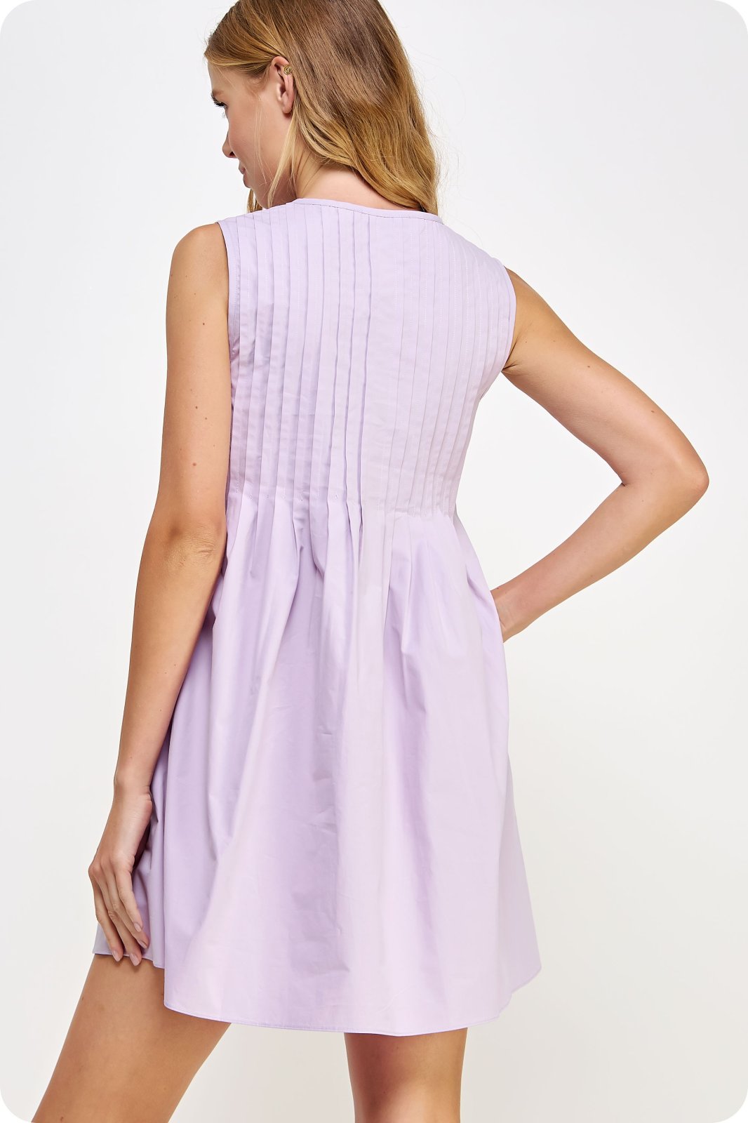 Lilla Dress from Raggdoll Boutique showcases pintuck tie detail in trendy coastal style, perfect for summer outfits Texas.