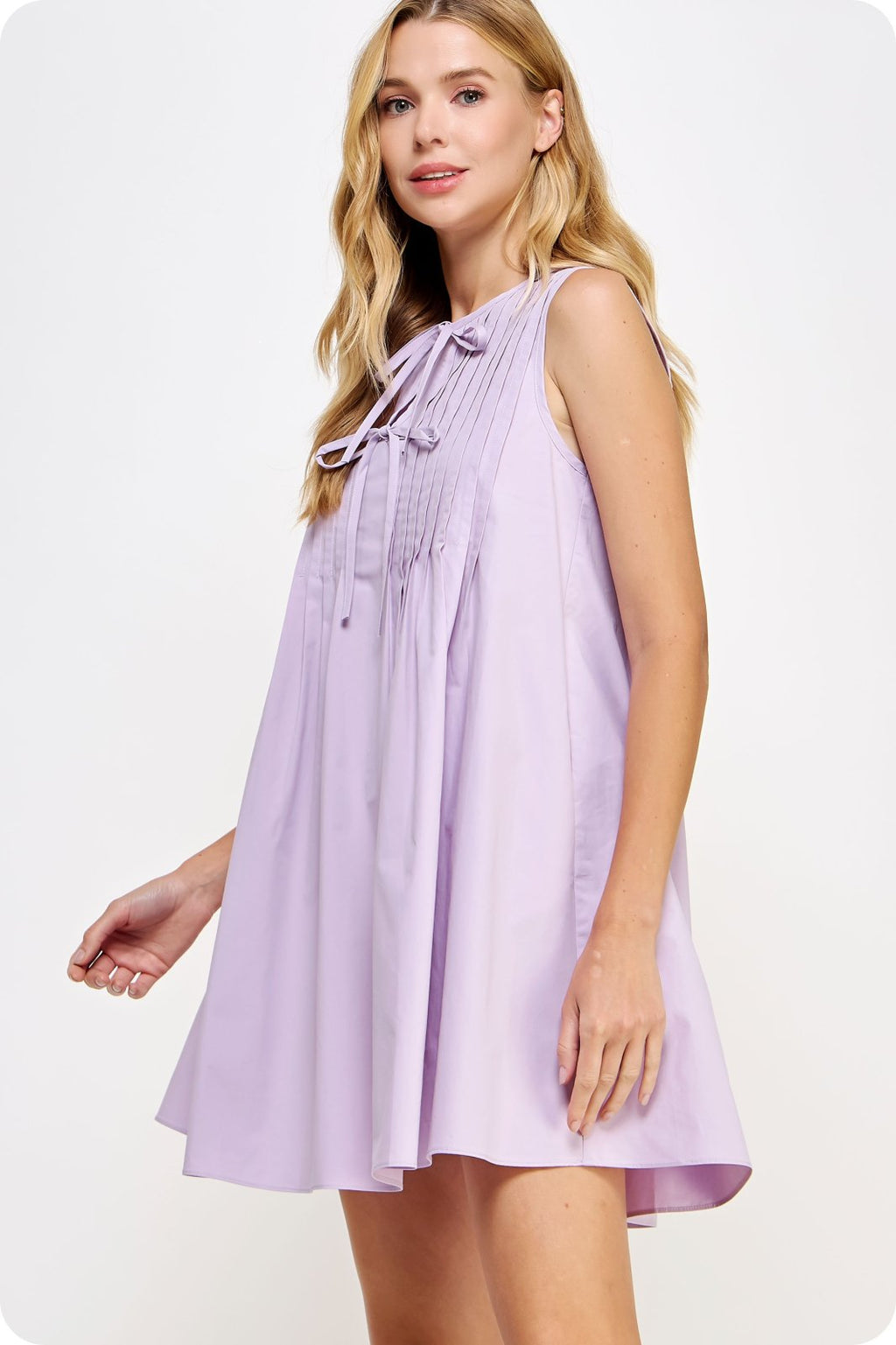 Lilla Dress: Pintuck Tie Detail Poplin Mini Dress from Raggdoll Boutique, perfect for trendy coastal style and summer outfits.