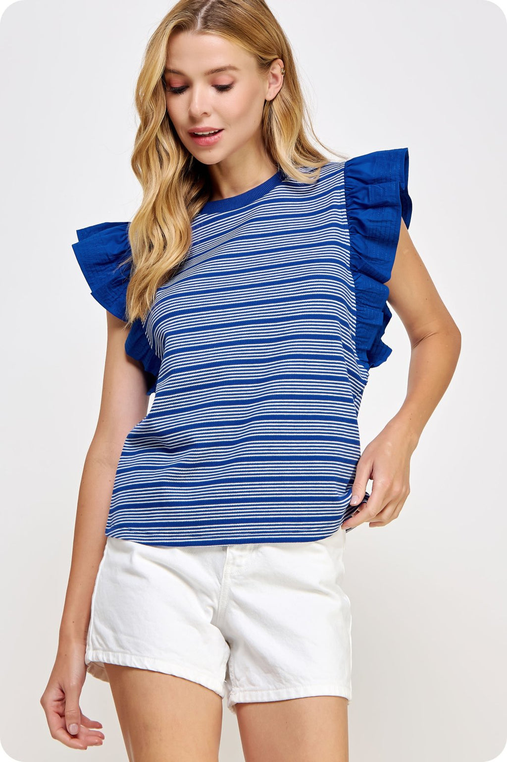 Becky Top featuring ruffle sleeves, perfect for trendy coastal style at Raggdoll Boutique in Port Aransas.