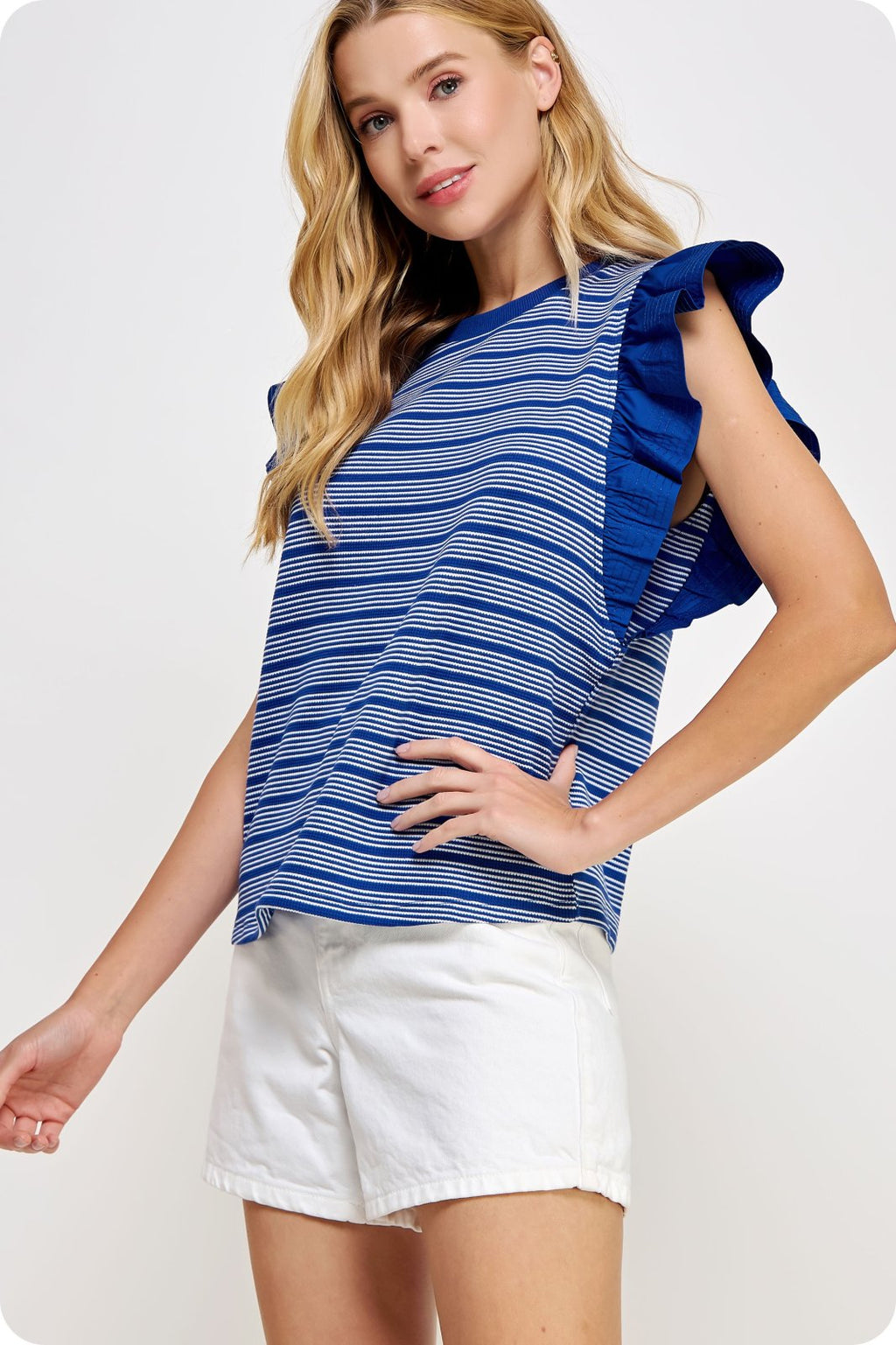 Becky Top from Raggdoll Boutique featuring blue stripes and ruffled sleeves, perfect for summer outfits Texas.