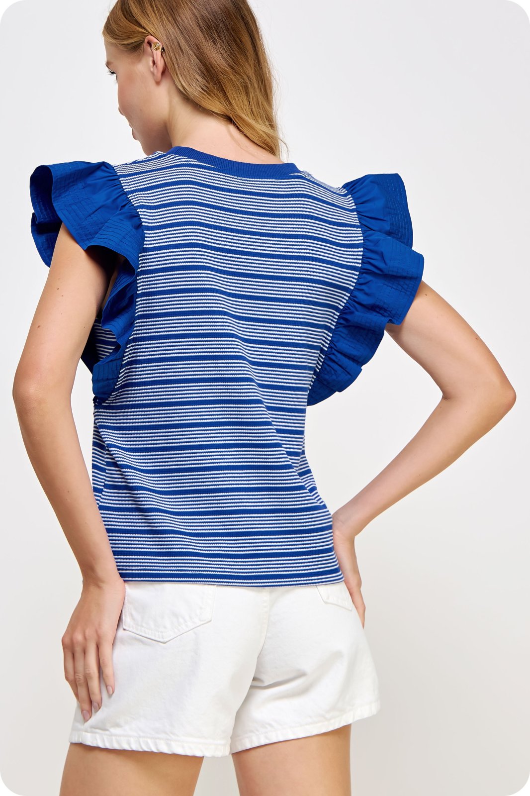 Becky Top from Raggdoll Boutique featuring trendy coastal style with blue stripes and ruffle sleeves, perfect for summer outfits Texas.