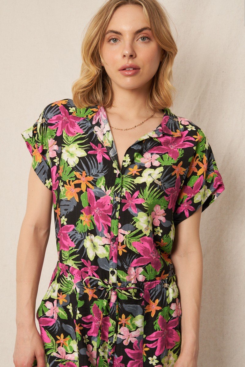 FUN FLORAL ROMPER BLACK/MAGENTA showcasing trendy coastal style at Raggdoll Boutique.