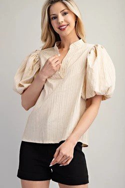 Hope Top in Cream styled with black shorts, perfect for summer vacation wardrobe at Raggdoll Boutique.