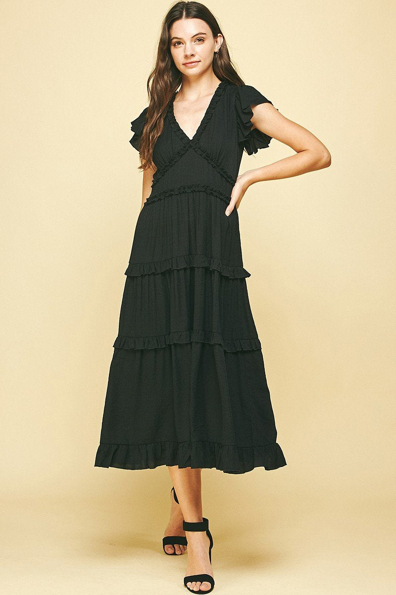 Sophie Dress in black tiered design, perfect for coastal boutique clothing, ideal for tropical vacation dresses.