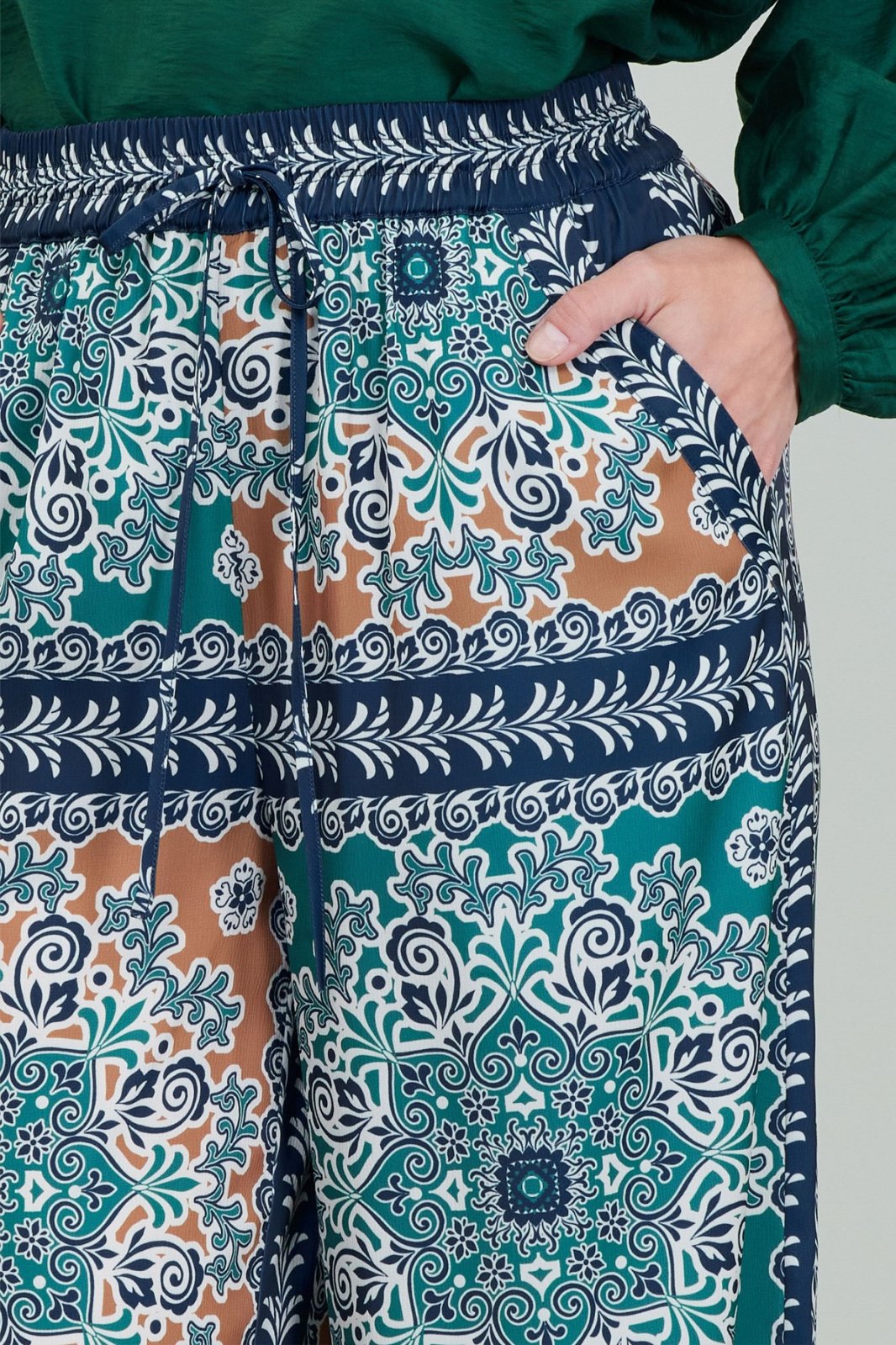 Colorful jewel-tone pants with an elastic waistband, perfect for coastal boutique clothing and stylish women's bottoms.