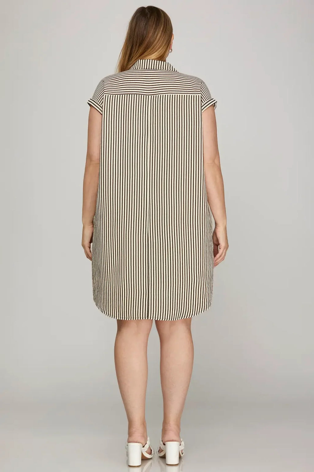 Plus size short sleeve woven striped mini dress from a coastal boutique, perfect for beach outings and tropical vacations.