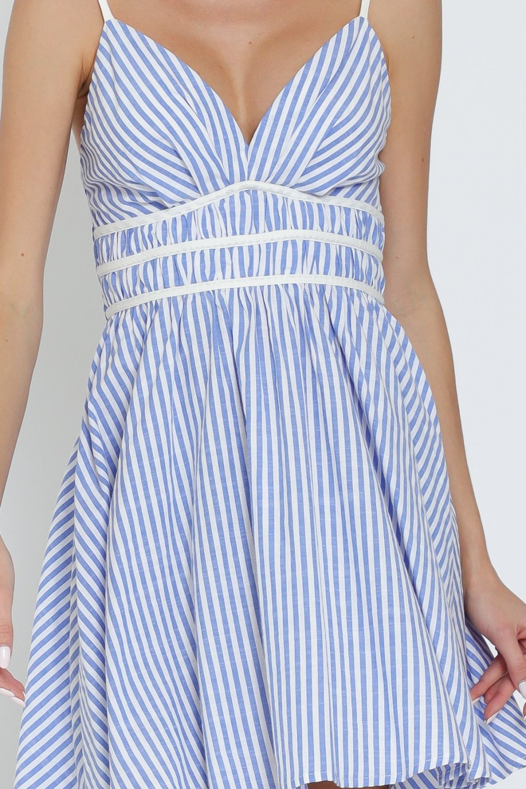 Blue and white striped mini dress from a coastal boutique, perfect for summer outings and curvy plus size fashion.