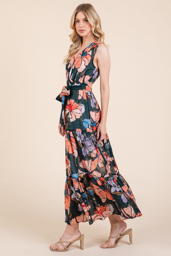 Multicolored floral maxi dress from a Port Aransas boutique, ideal for tropical vacations and beach parties.