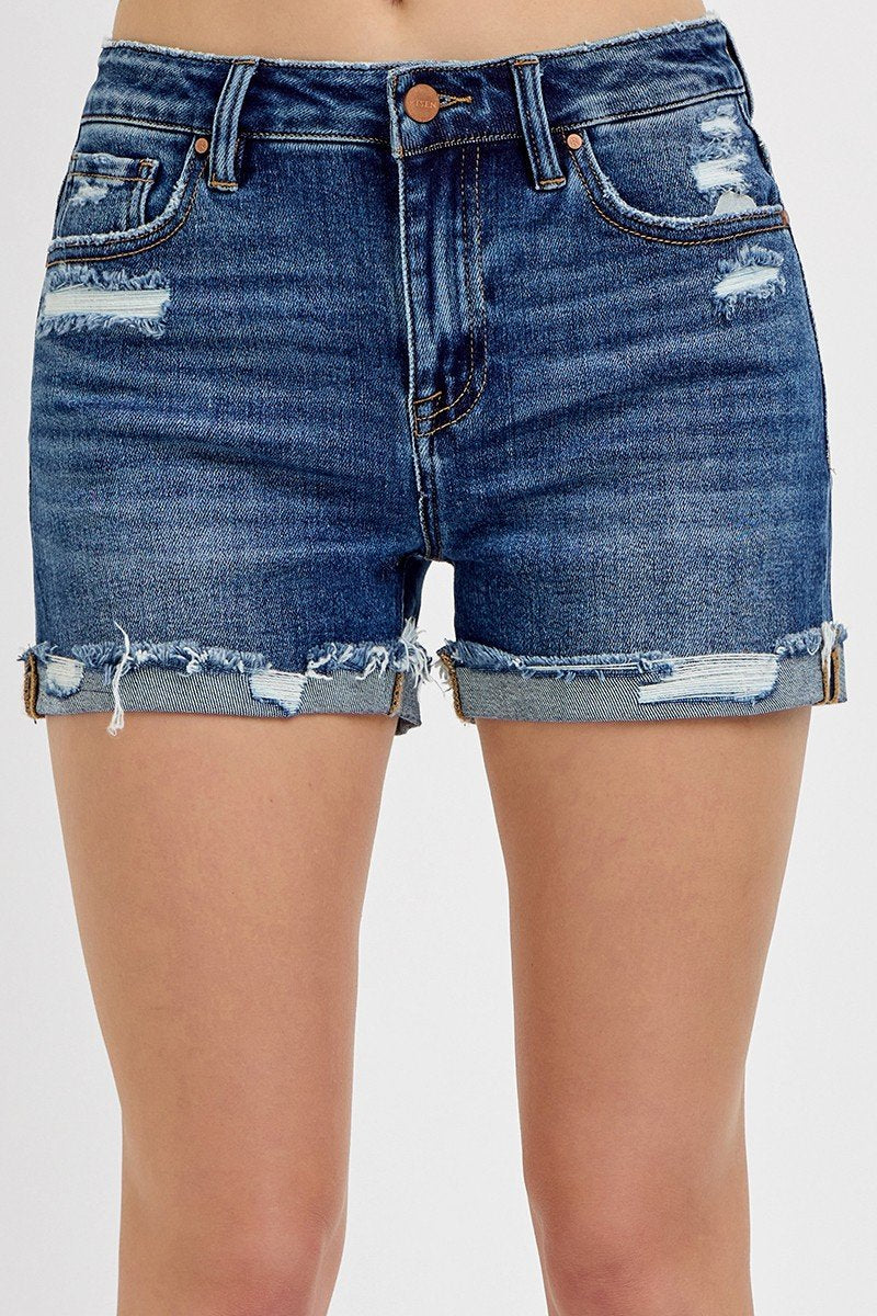 Risen Dark Mid-Rise Cuffed Shorts in distressed dark denim, perfect for coastal boutique clothing and summer fashion.