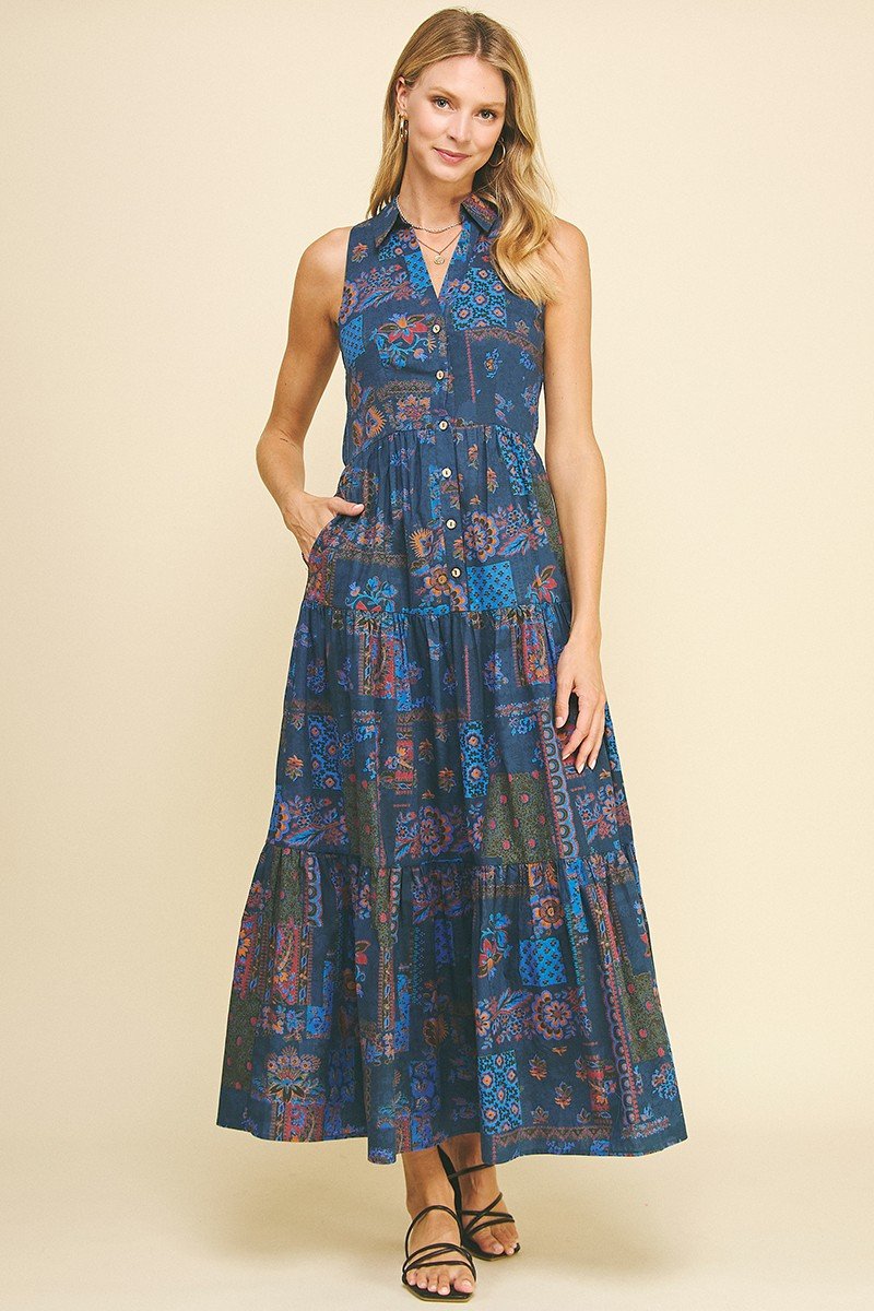 Edith Dress by coastal boutique, sleeveless tiered maxi with pockets, perfect for beach outings and tropical vacations.
