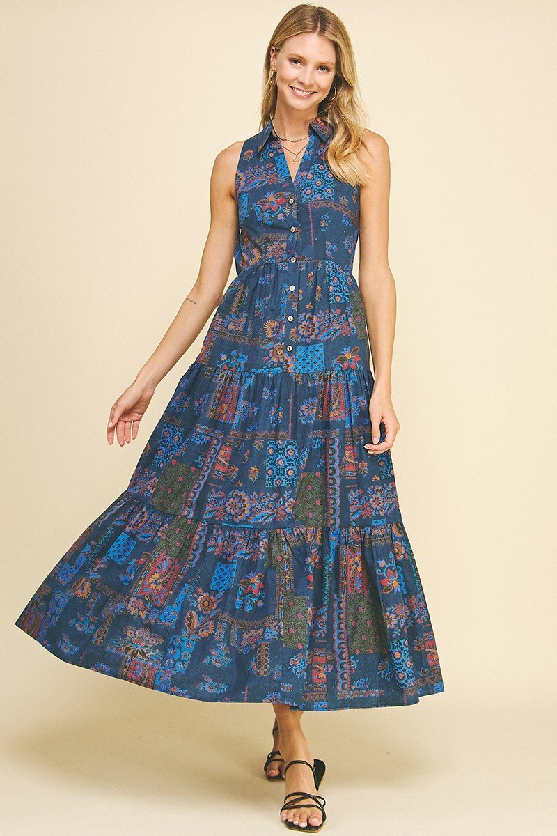 Edith Dress: sleeveless knit dress with buttons, side pockets, perfect for coastal boutique clothing and beach outings.