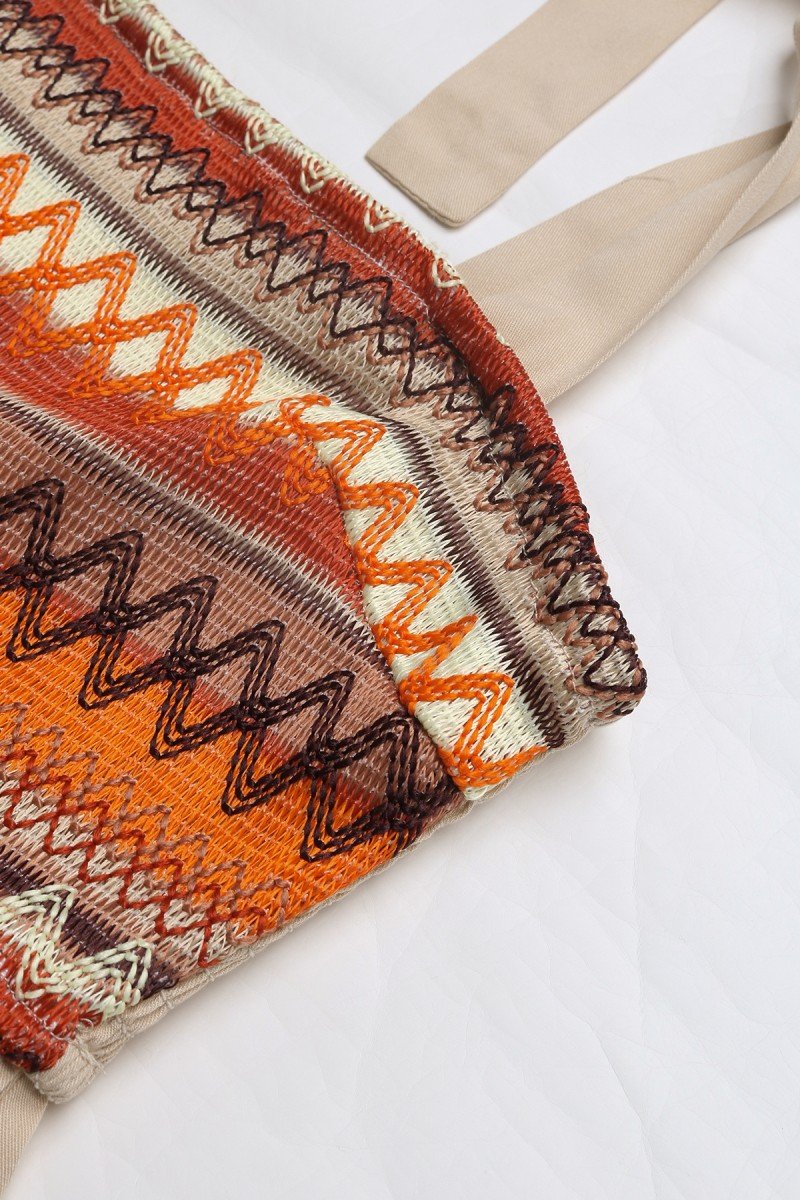 Beige tied shoulder strap with intricate Aztec print, perfect for coastal boutique clothing and tropical vacation dresses.