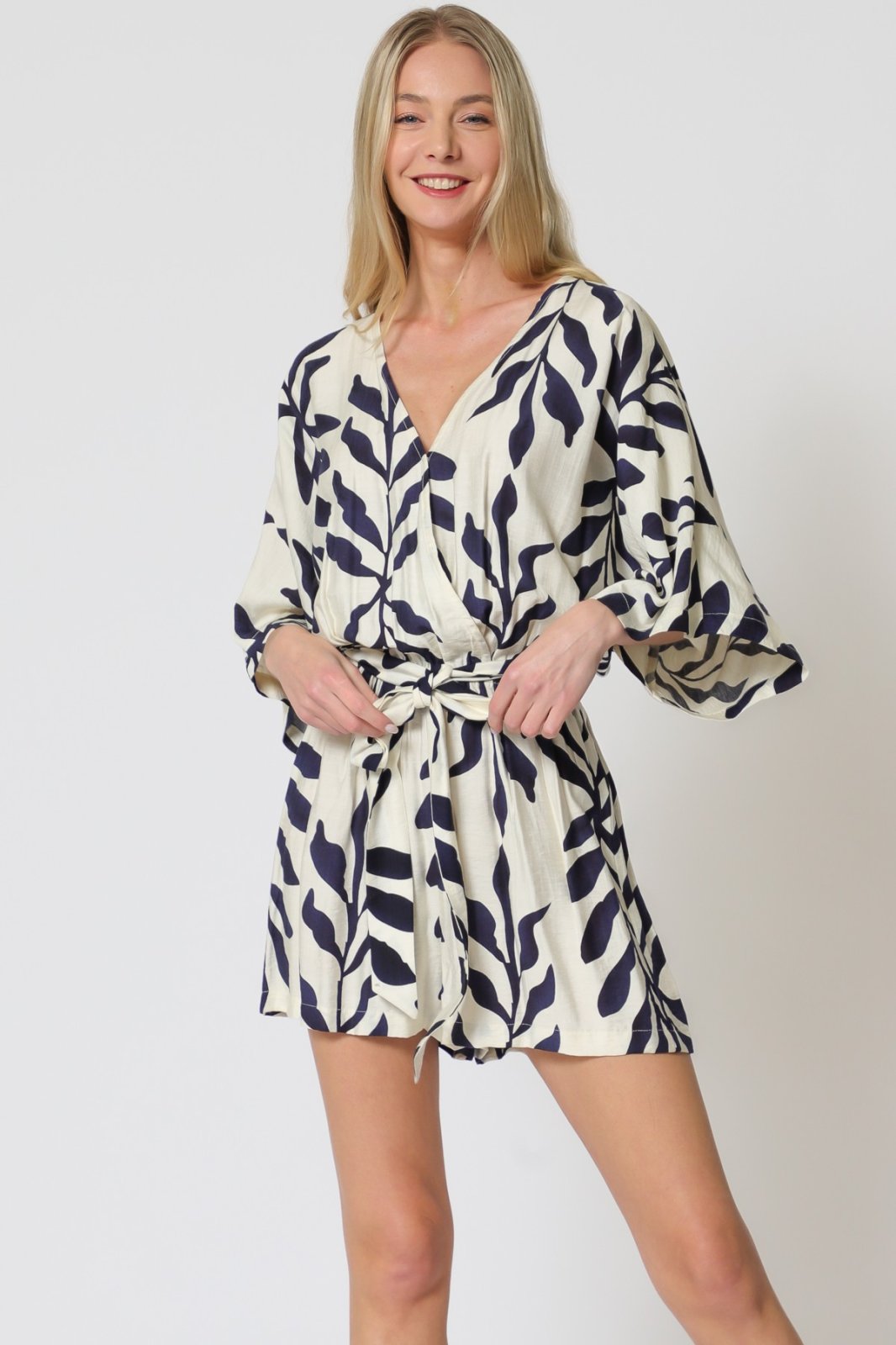 Ivory & navy Vivian romper with kimono sleeves, perfect for coastal boutique clothing and tropical vacations.