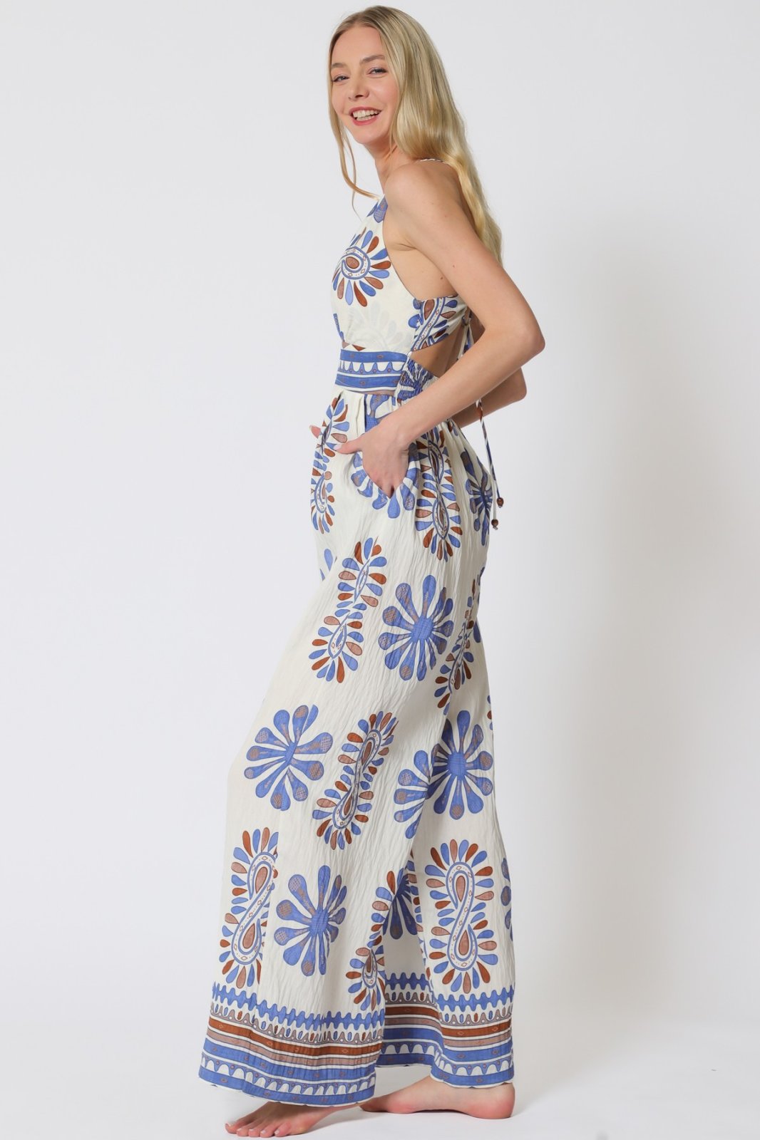 Stylish blue print jumpsuit from a Port Aransas boutique, perfect for tropical vacations and curvy plus size fashion.