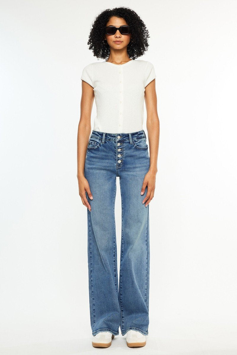 High rise 90's flare jeans in medium wash, perfect for coastal boutique clothing and stylish women's fashion.