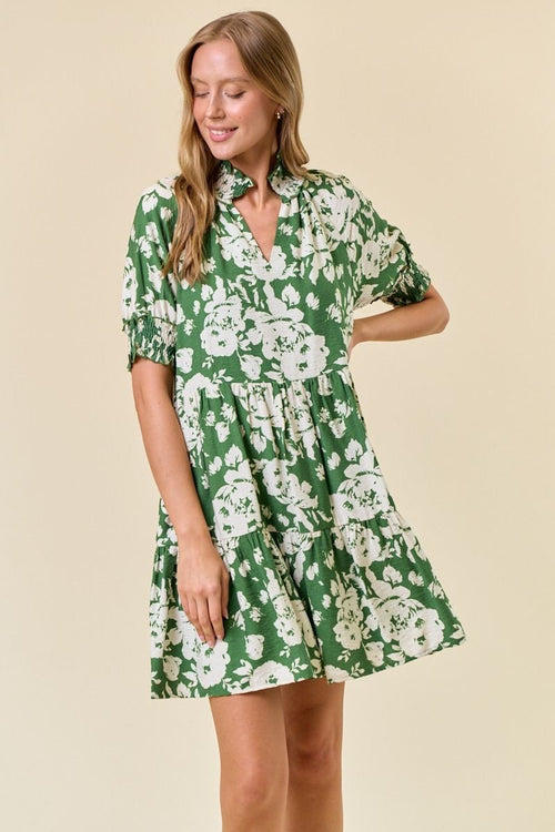 Green floral smocked neck dress from Port Aransas boutique, perfect for beach outings and tropical vacations.