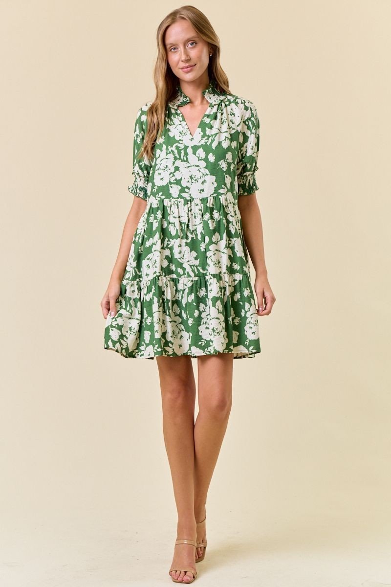 Green floral smocked neck dress, perfect for coastal boutique clothing and tropical vacation styles. Great for summer outings.