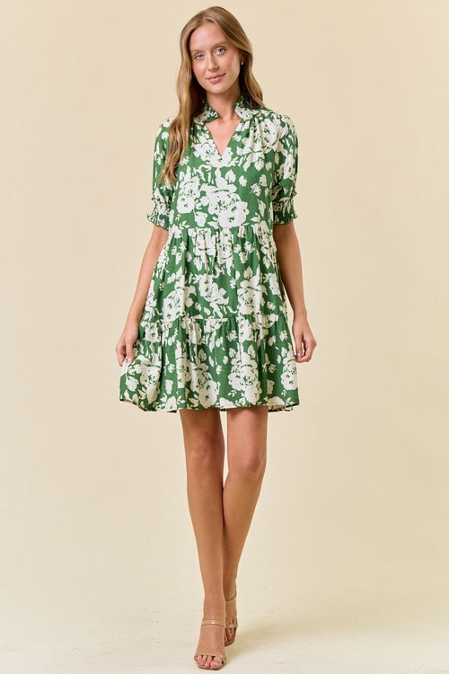 Green floral smocked neck dress, perfect for coastal boutique clothing and tropical vacation styles. Great for summer outings.