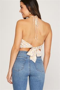 Woman wearing RUFFLED TUBE TOP with jeans, showcasing trendy coastal style from Raggdoll Boutique.
