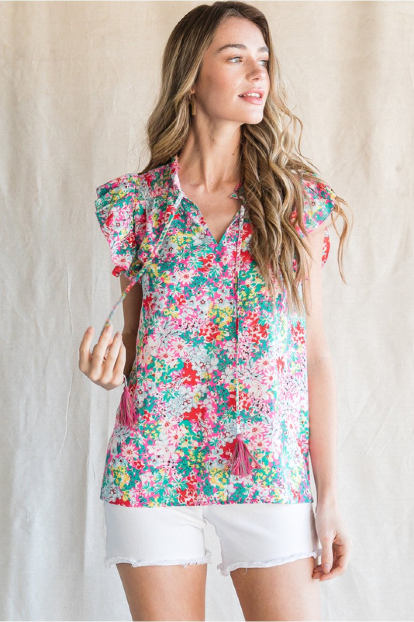 PINK MULTI FLORAL TOP - Floral print top with tassels from Raggdoll Boutique, perfect for trendy coastal style.