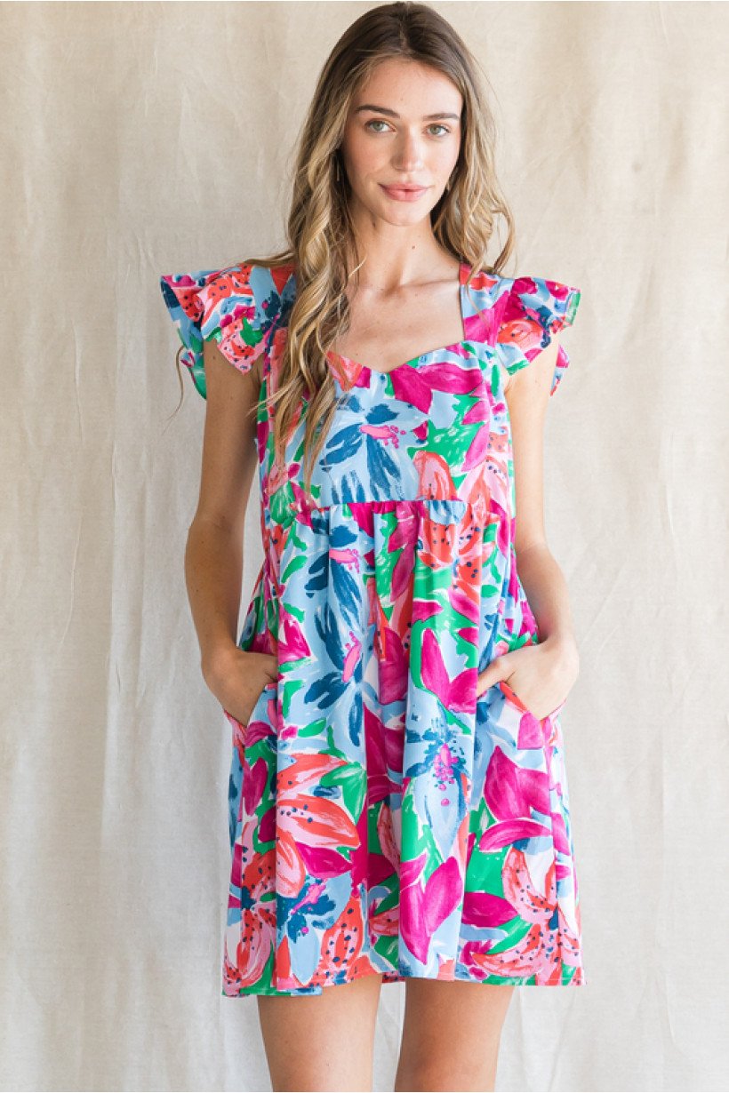 BOLD BLOOMS DRESS showcasing vibrant floral print, perfect for summer outfits Texas at Raggdoll Boutique.