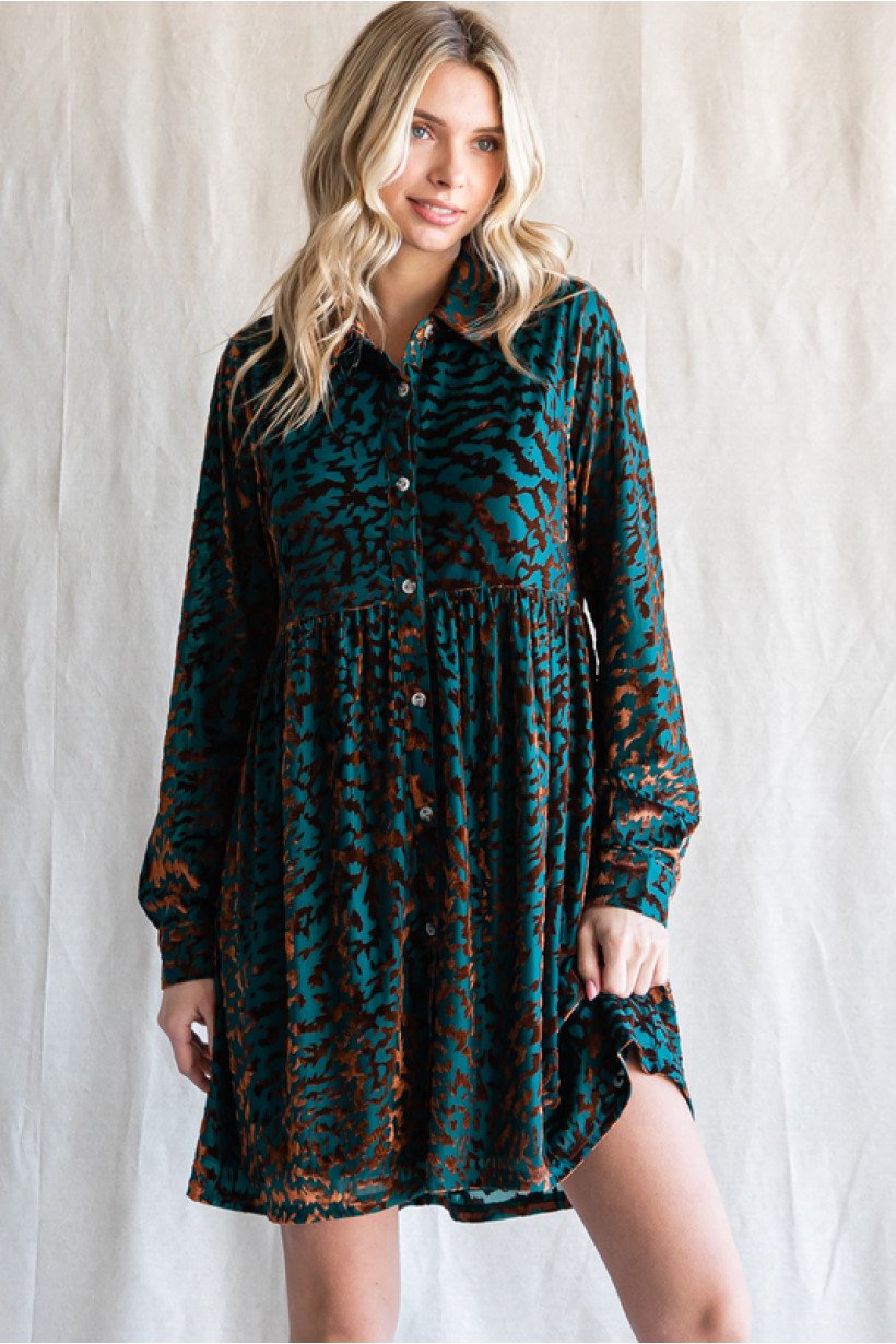 Model wearing PLUS VELVET TEAL LEOPARD DRESS from Raggdoll Boutique, showcasing trendy coastal style.