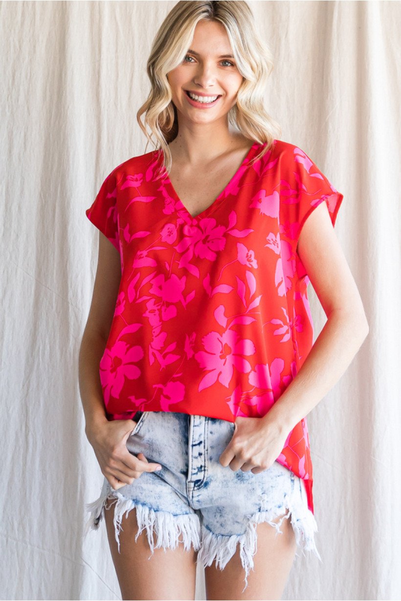 RED AND PINK FLORAL TOP displayed on a model, perfect for summer outfits Texas at Raggdoll Boutique.