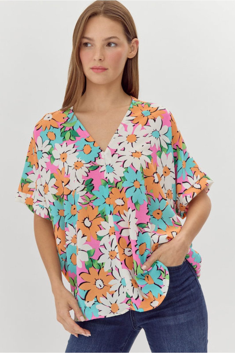PINK MIX TOP (SOLID FLOWER PRINT) from Raggdoll Boutique featuring a colorful floral pattern, perfect for summer outfits Texas.