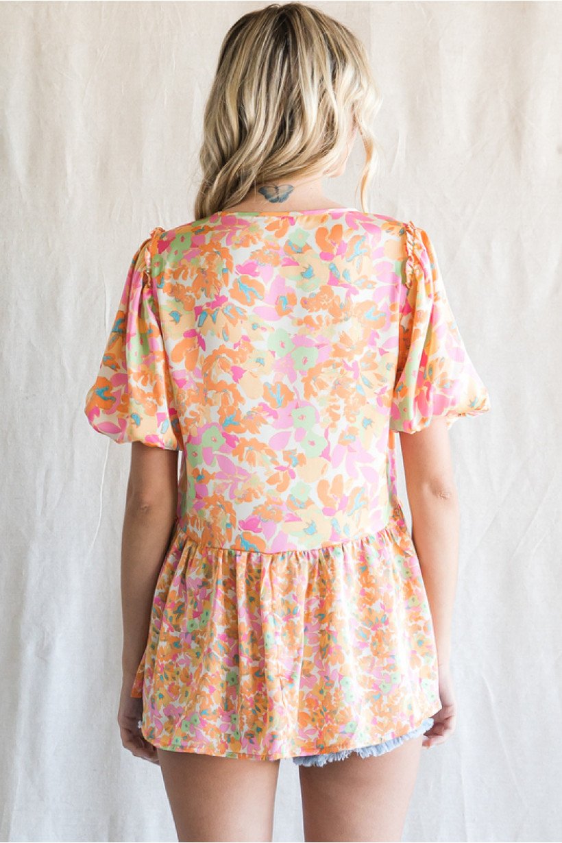 PINK, YELLOW AND TURQUOISE TOP back view with short puffed sleeves, perfect for summer outfits Texas at Raggdoll Boutique.