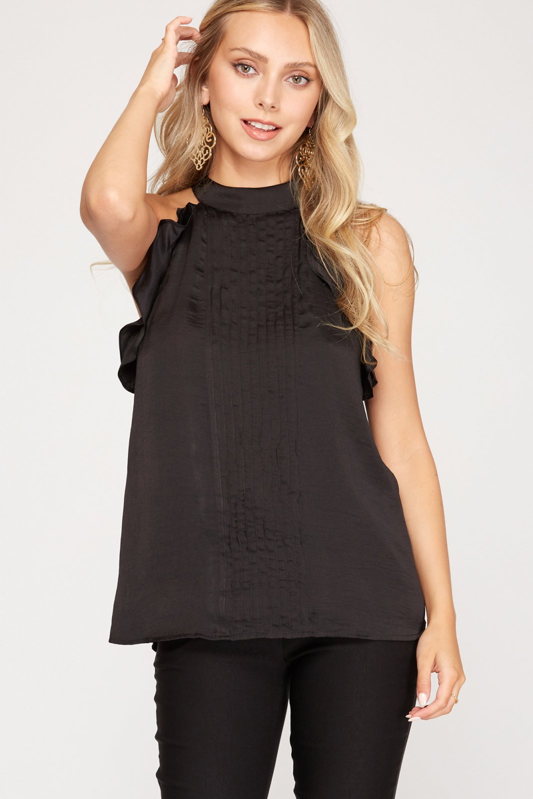 LOVE BLACK! SATIN HALTER TOP worn by model at Raggdoll Boutique, showcasing trendy coastal style.