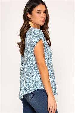 Model wearing I FEEL TEAL TOP from Raggdoll Boutique showcasing trendy coastal style.