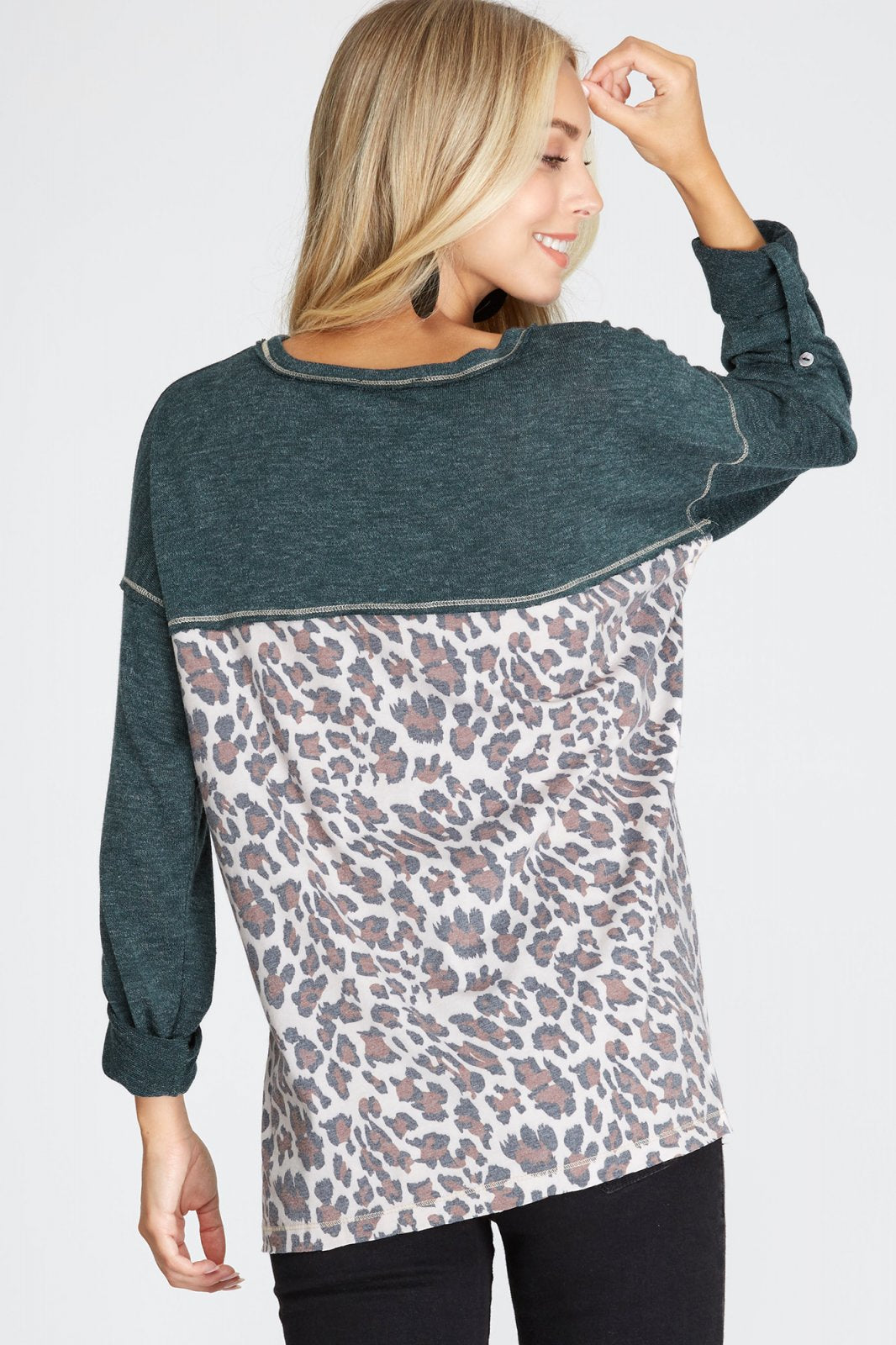 TEAL LONG SLEEVE WITH ANIMAL PRINT ON BACK TOP from Raggdoll Boutique, perfect for trendy coastal style.