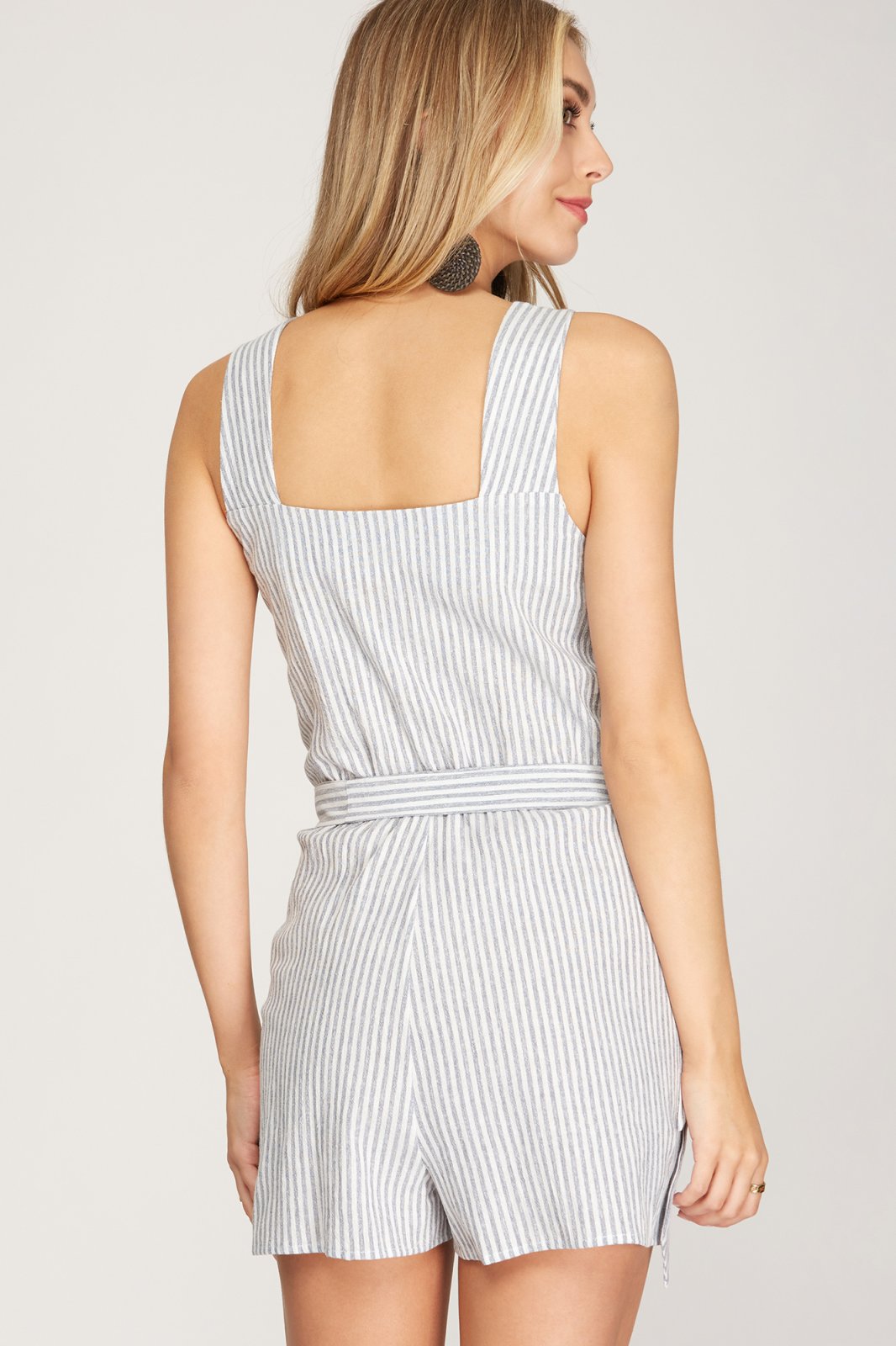 Back view of NAVY STRIPED ROMPER, perfect for summer outfits Texas, from Raggdoll Boutique.