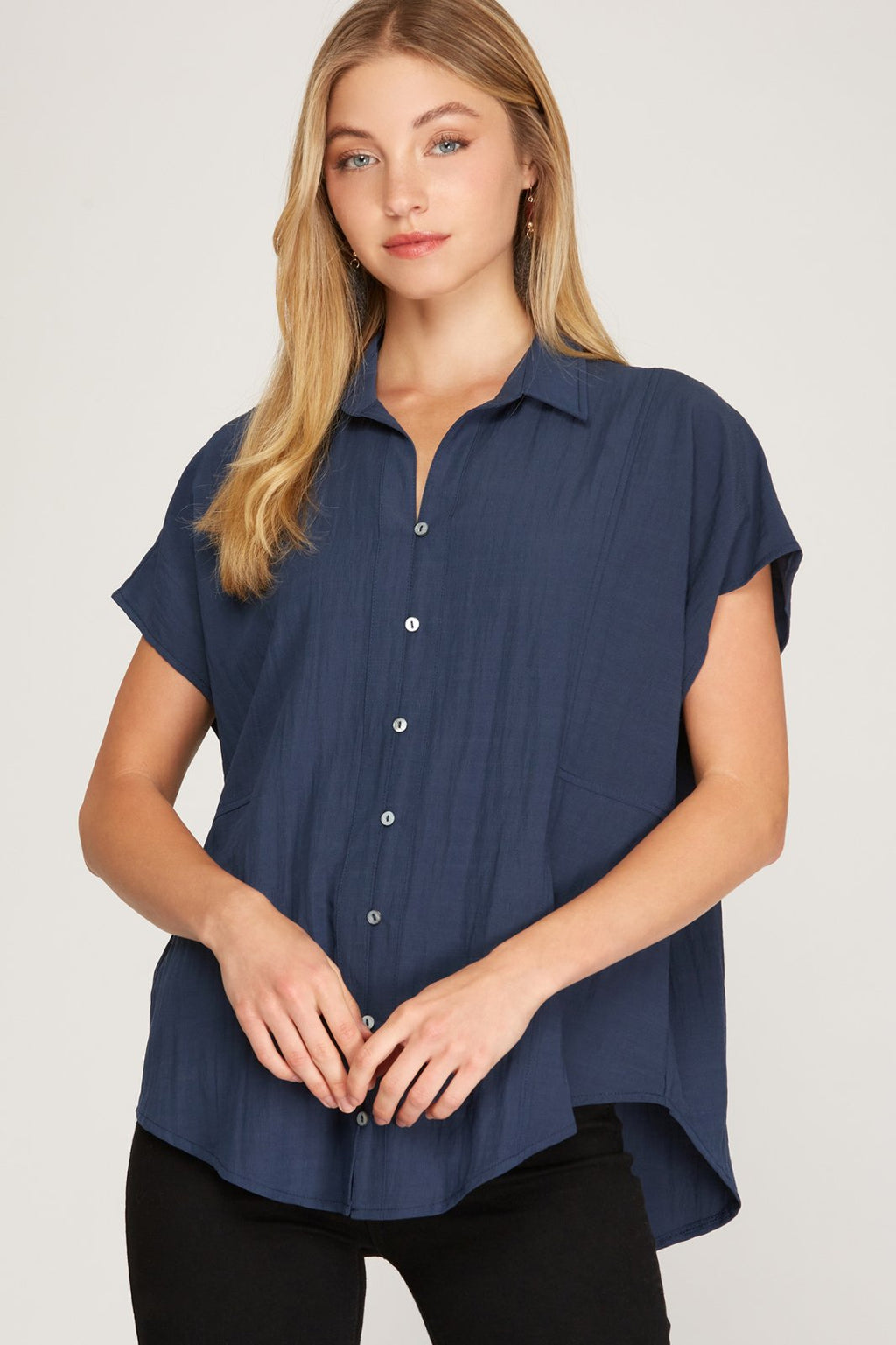 Navy blue button down shirt from Raggdoll Boutique, stylish drop shoulder design perfect for summer outfits Texas.