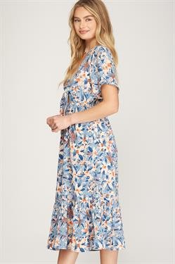 FLIRTY IN FLORAL DRESS from Raggdoll Boutique showcases trendy coastal style, perfect for summer outfits in Texas.