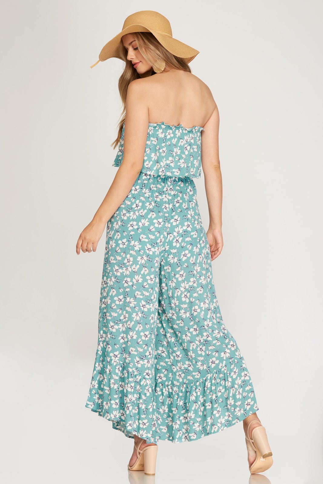 AQUA FLOWERS JUMPSUIT showcased in a back view, perfect for summer outfits Texas from Raggdoll Boutique.