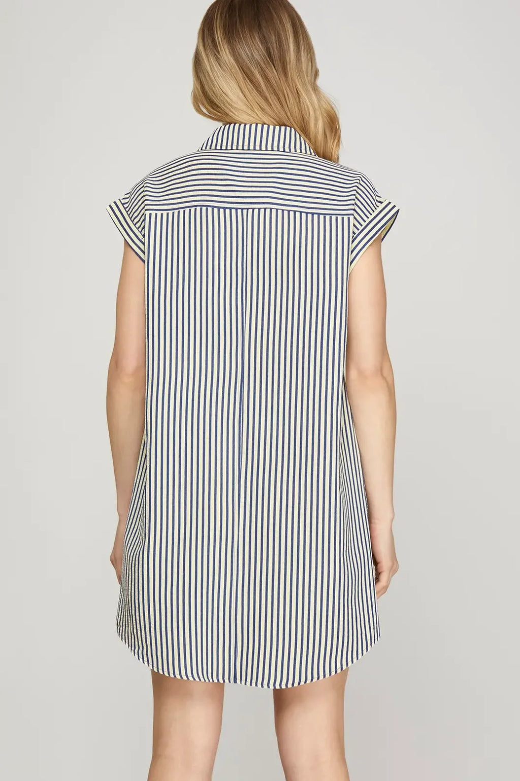 Back view of the Grace Dress in navy and white stripes, perfect for coastal boutique clothing and fashionable gift cards.
