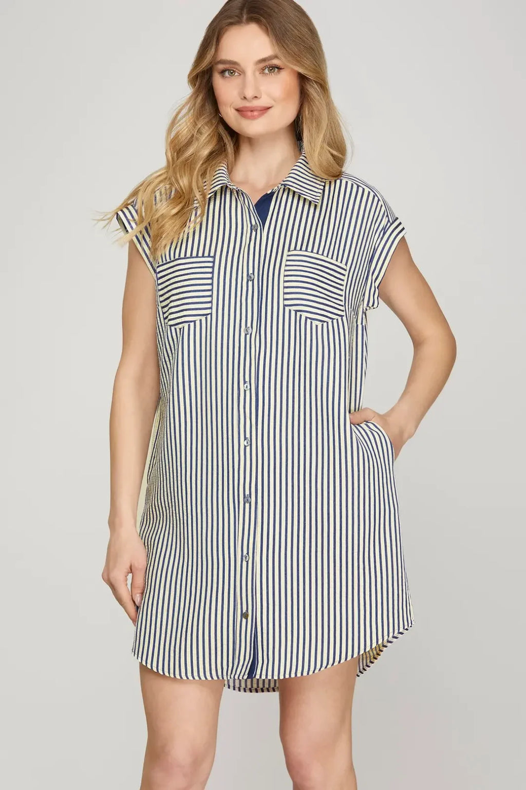 Navy striped mini shirt dress with button-down front, perfect for coastal boutique clothing and casual beach days.