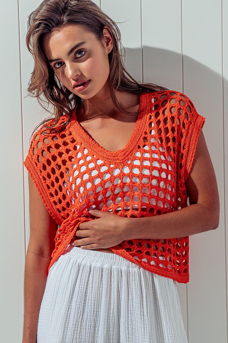 Orange Crochet Top styled with summer outfits from Raggdoll Boutique, perfect for coastal fashion in Port Aransas.