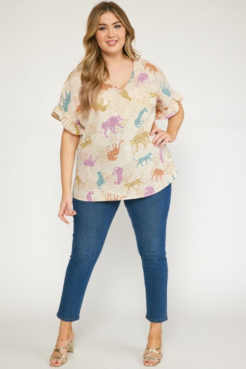 PLUS CREAM MULTI CHEETAH TOP styled with jeans from Raggdoll Boutique for a trendy coastal style.
