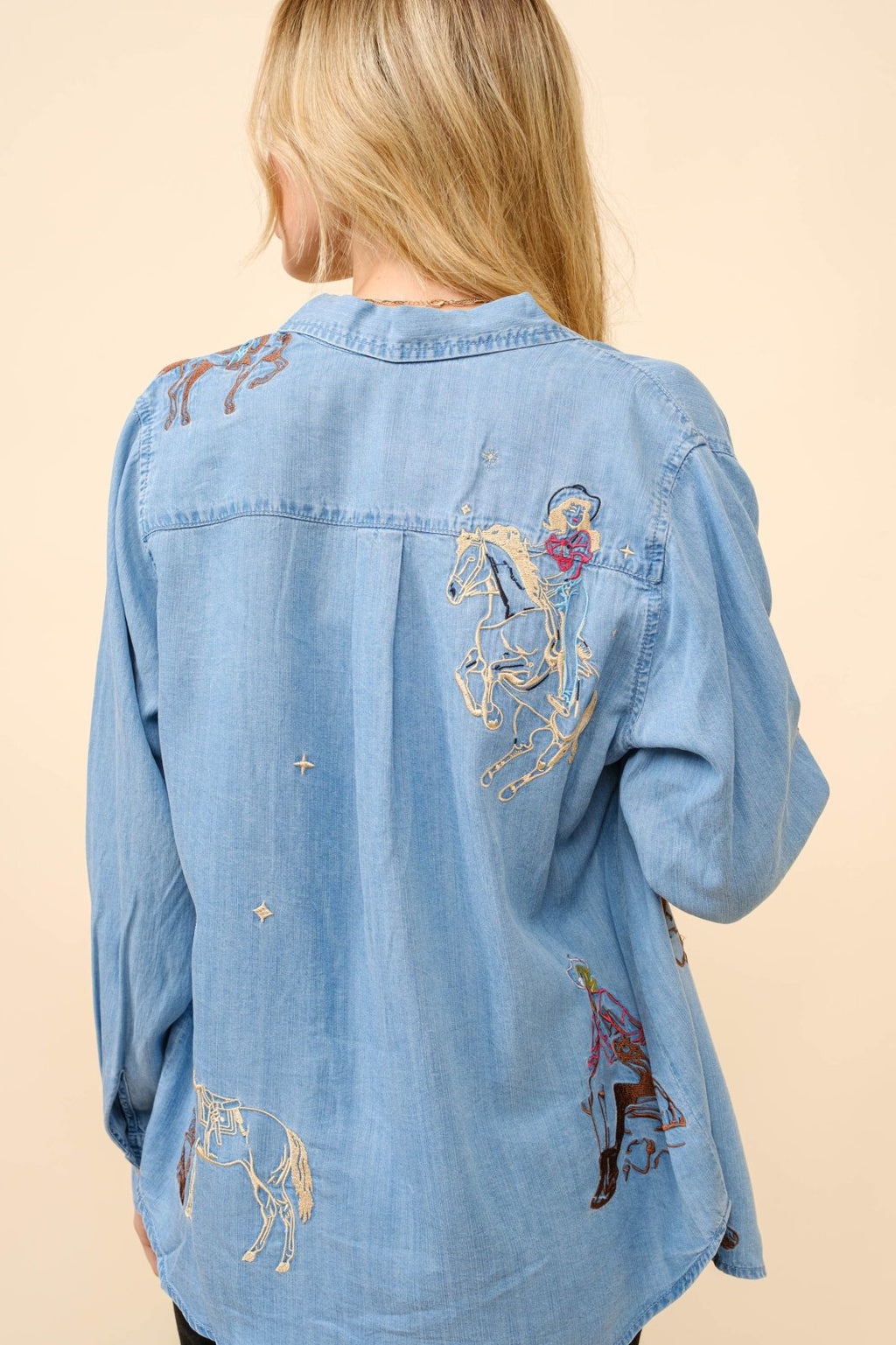 Stylish Western motif embroidered Tencel denim top for women, perfect for coastal boutique clothing and beach excursions.