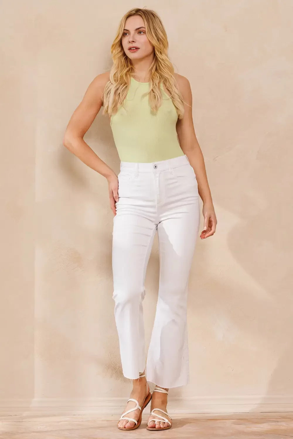 SP HIGH RISE KICK FLARE JEANS WITH RAW CUT HEM (WHITE) styled with trendy coastal fashion for summer outfits Texas.